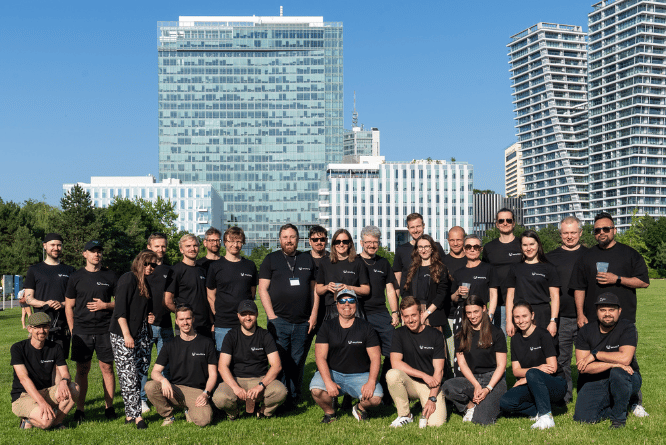 Group Picture with Sky Skrapers in the Background